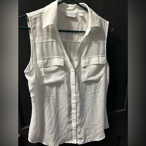 White sleeveless blouse